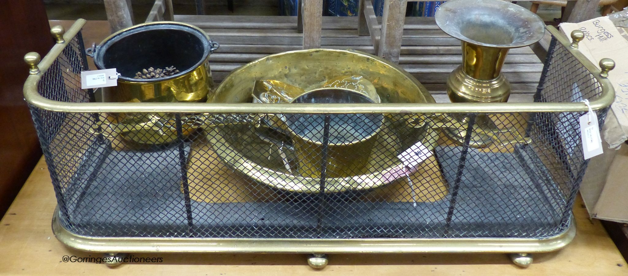 A Victorian brass and steel mesh fender and sundry other metalware